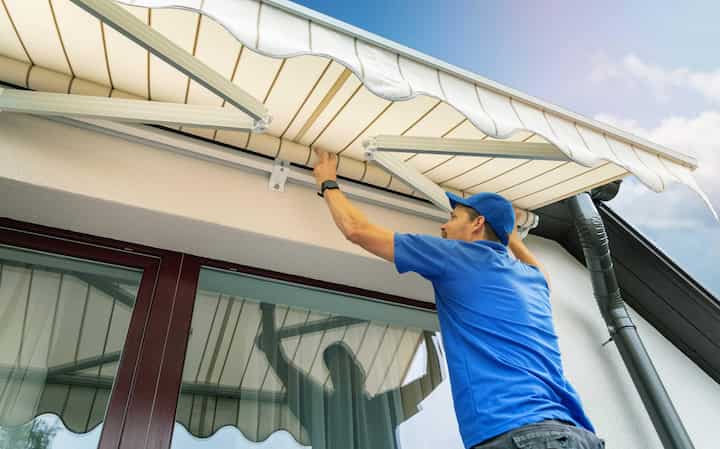 Expert awning installation in Greenwood, IN property.